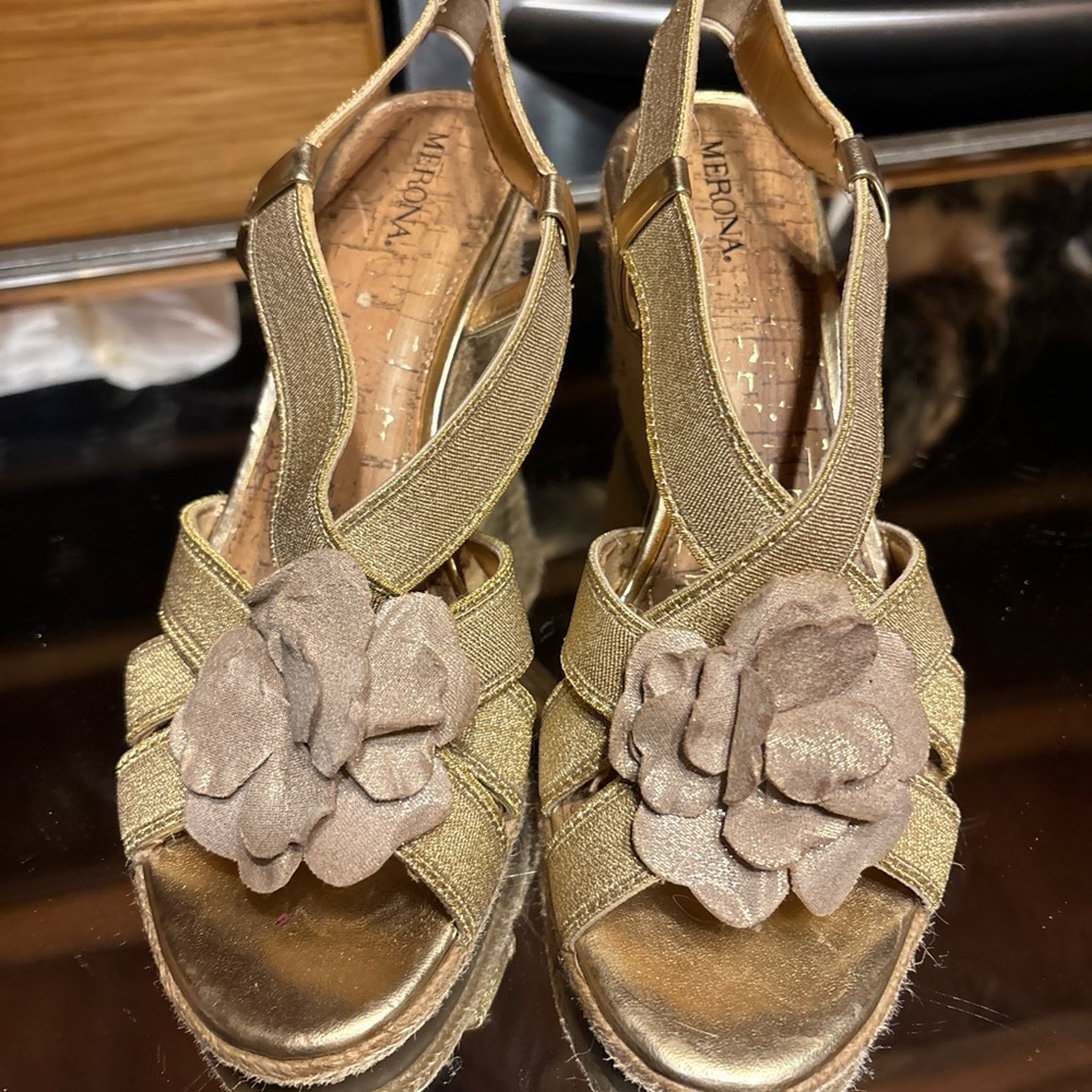 Ladies gold wedges with flower detail